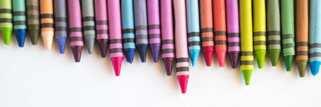 Vibrant collection of sharpened crayons in a diverse color palette, ideal for bulk educational or creative supplies.
